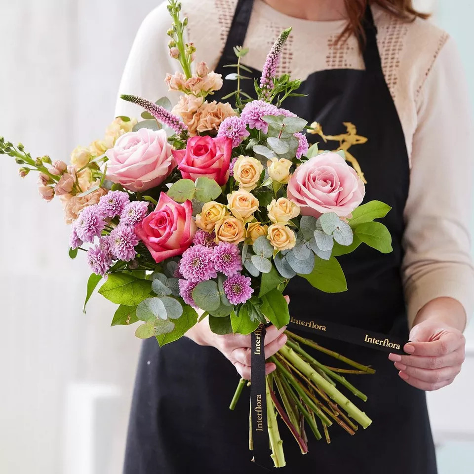 Hand-tied bouquet made with beautiful fresh flowers